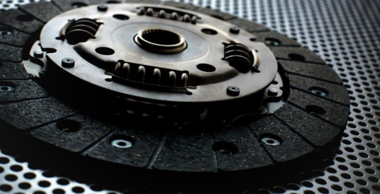 Clutch repair and replacement Nottingham — close-up of a car clutch inside a garage during professional maintenance.