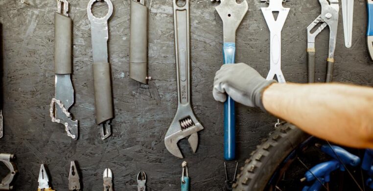 Close-up of professional mechanic tools neatly arranged in a garage, representing expert services for car repair in Nottingham.
